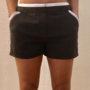 Black Fora dress shorts with a white trim